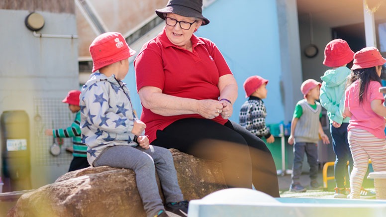 coaching their grandson by grandma